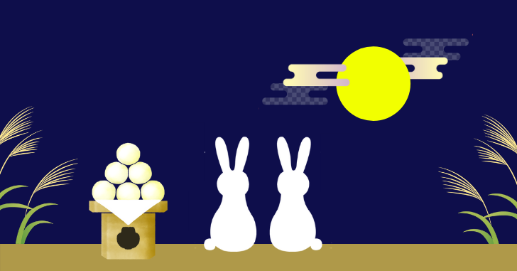 お月見をするうさぎと月見団子のイラスト